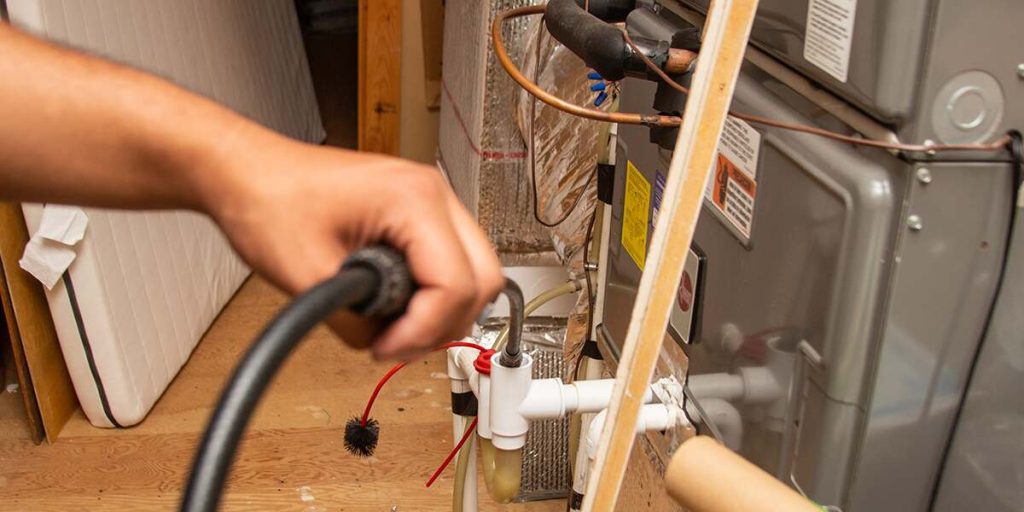 why do i smell gas when my furnace kicks on