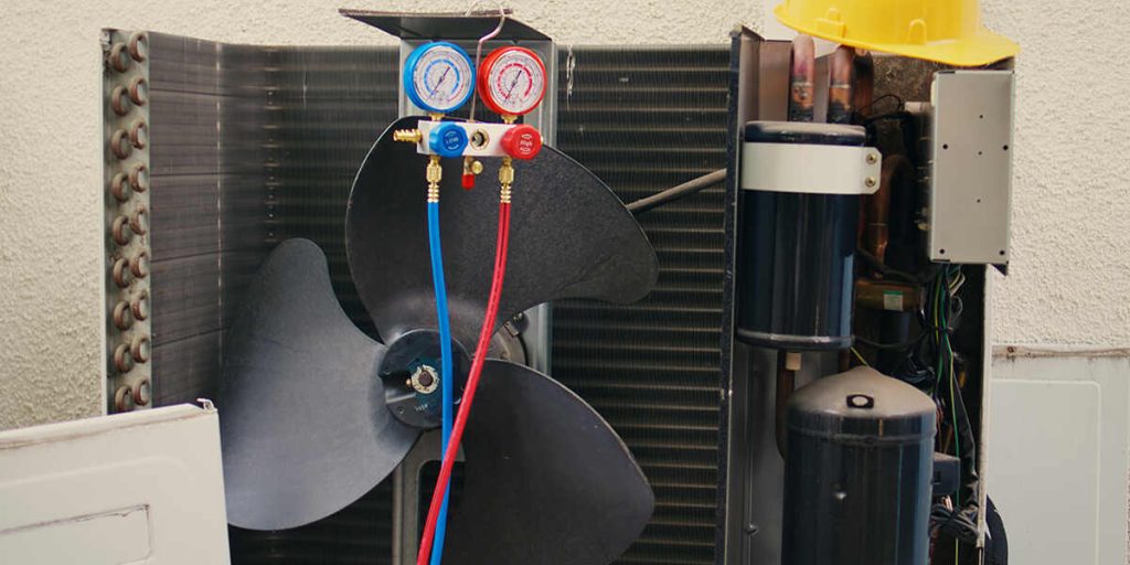 symptoms of low refrigerant in ac unit