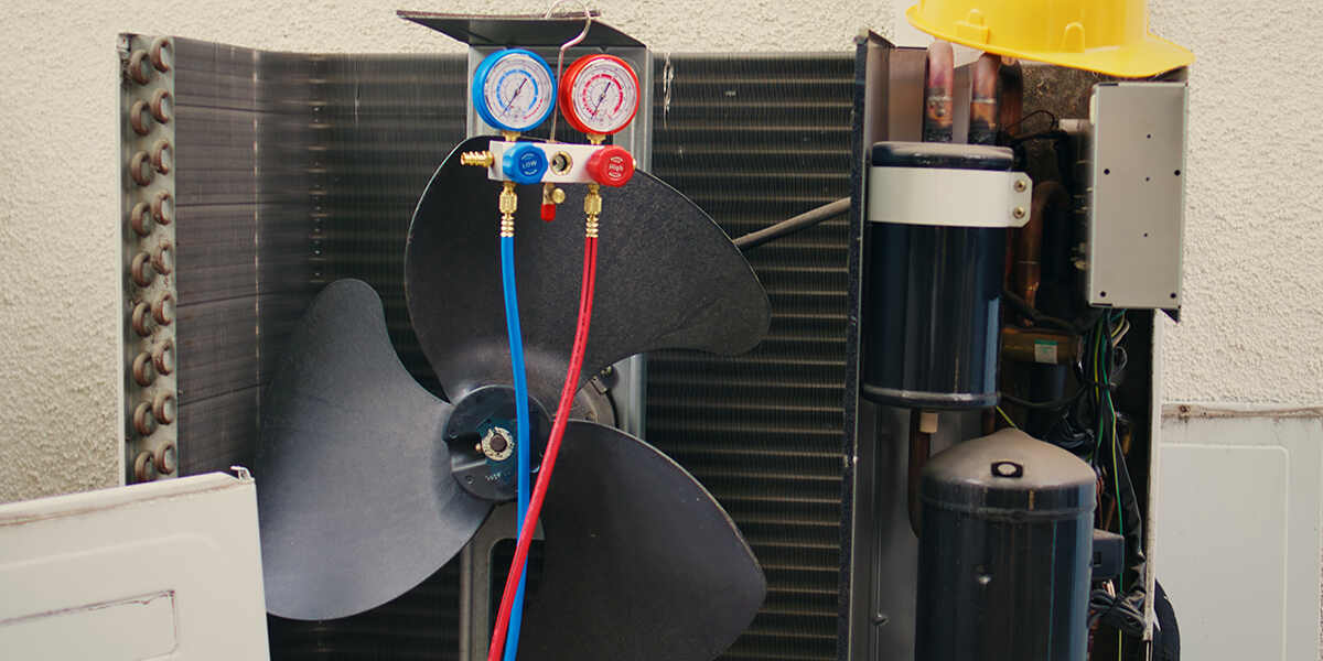 symptoms of low refrigerant in ac unit